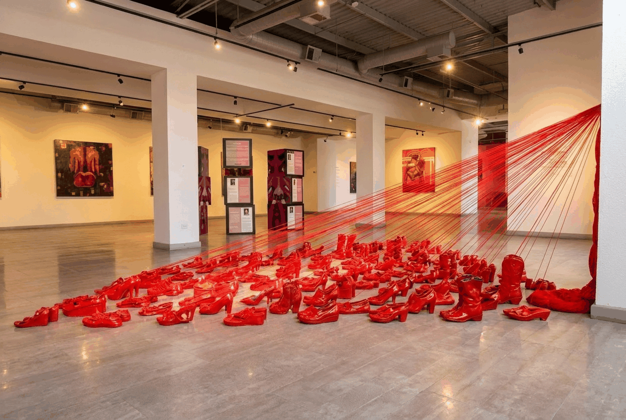 Exhibition hall of Mexicali’s Galería de la Ciudad with a red installation